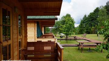 Фото номера Шале с одной спальней Лоджи Ośrodek Laskowo domki nad jeziorem г. Laskowo 4